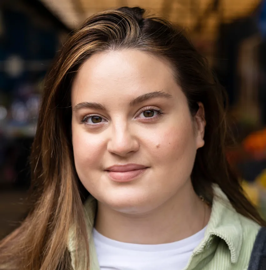 Young woman with brown hair.